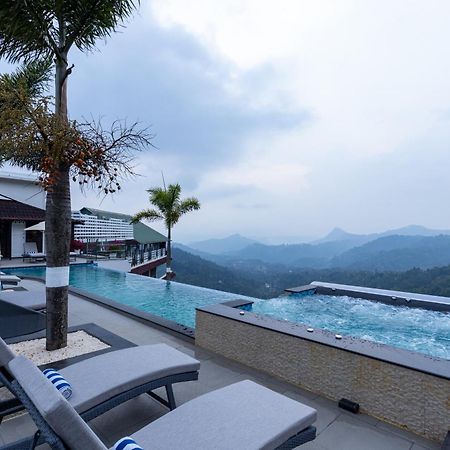 The Panoramic Getaway Hotel Munnar Kültér fotó The swimming pool at the resort