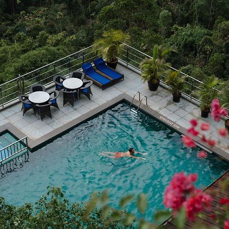 The Panoramic Getaway Hotel Munnar Kültér fotó The swimming pool at the hotel