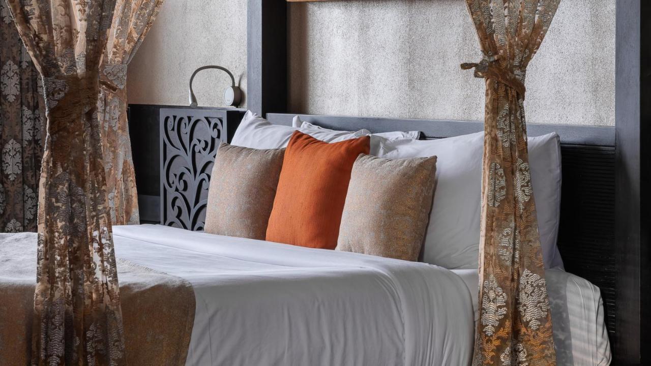 The Panoramic Getaway Hotel Munnar Kültér fotó A bed with cushions