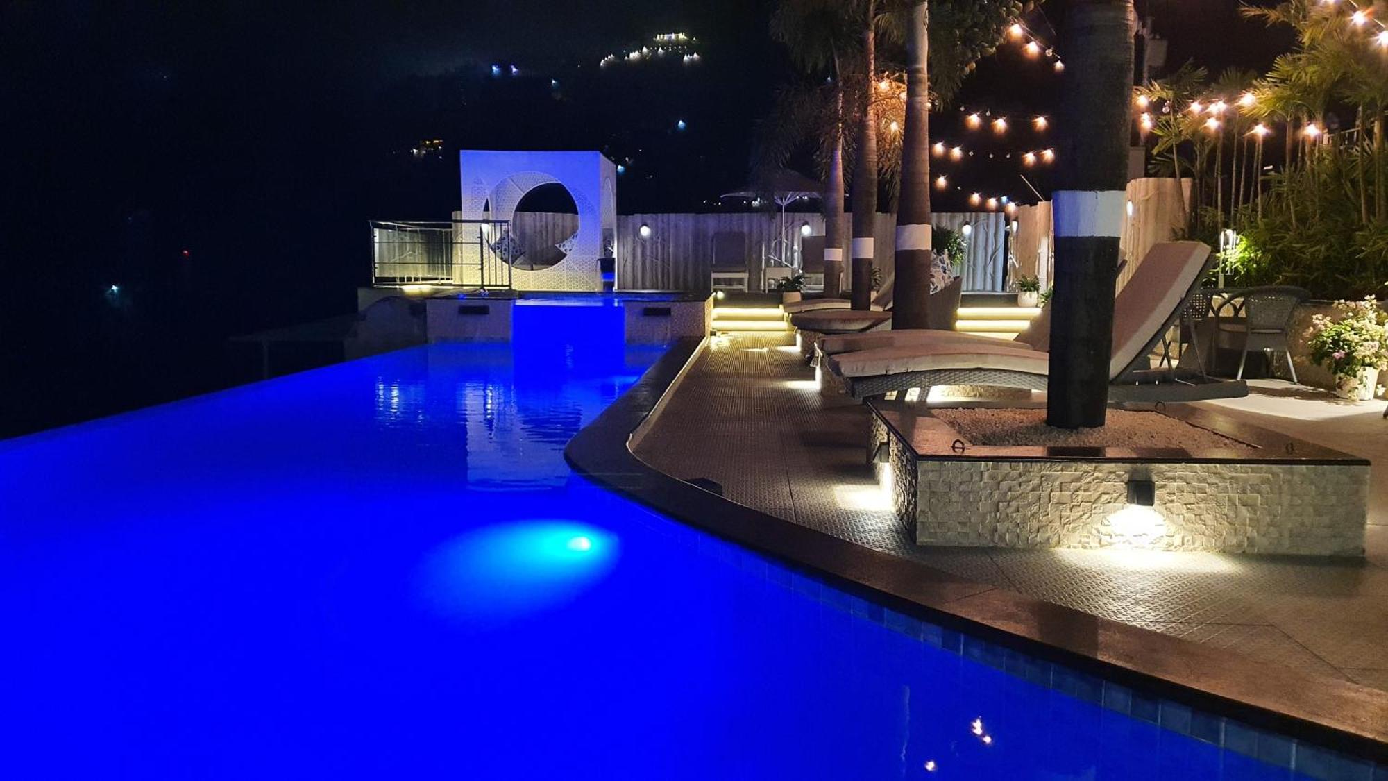 The Panoramic Getaway Hotel Munnar Kültér fotó The pool at the hotel