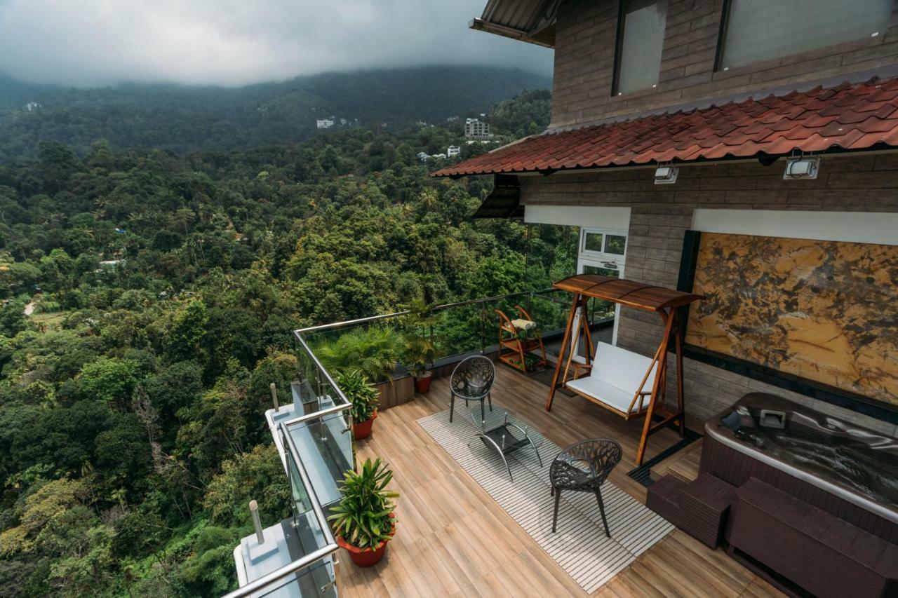 The Panoramic Getaway Hotel Munnar Kültér fotó A view from the balcony of a house in Kerala, India
