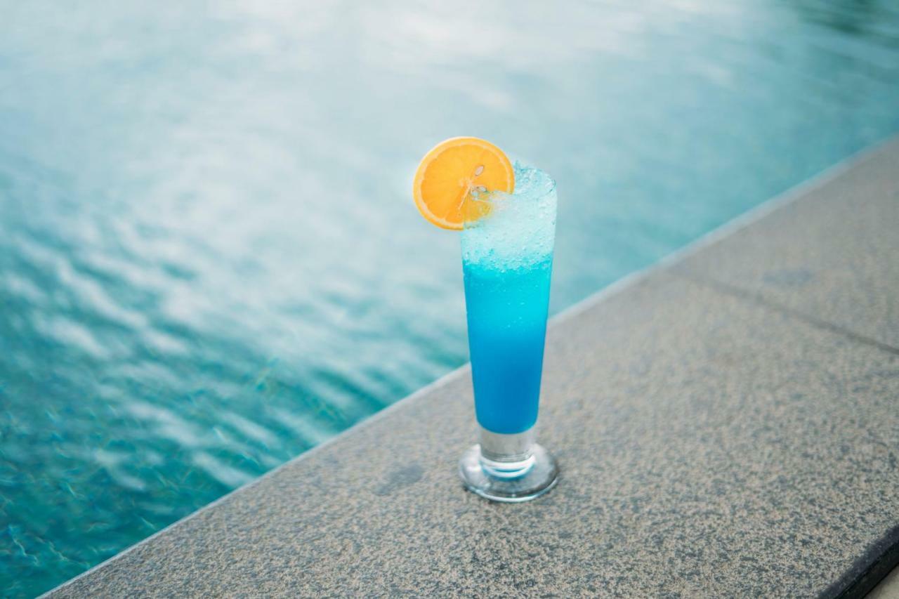 The Panoramic Getaway Hotel Munnar Kültér fotó Blue Hawaii